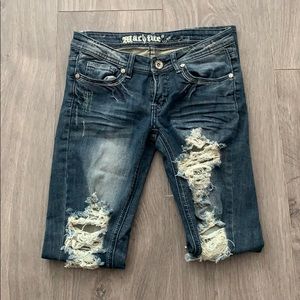 Machine shredded jeans